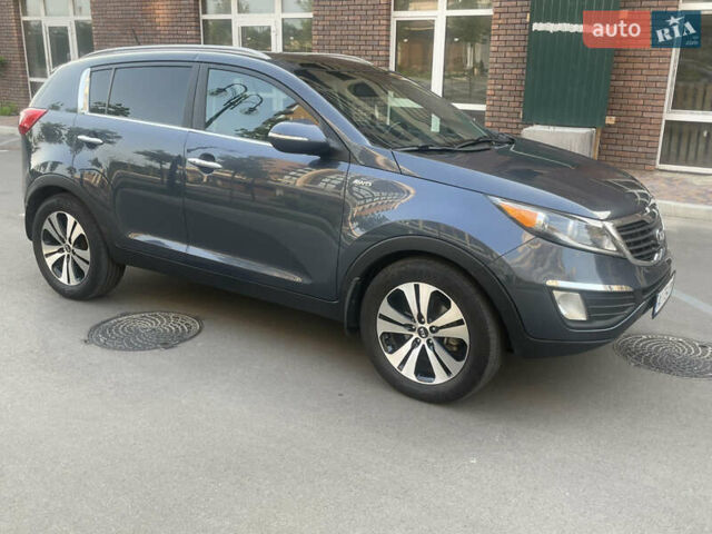 Синий Киа Sportage, объемом двигателя 2.4 л и пробегом 280 тыс. км за 12000 $, фото 6 на Automoto.ua
