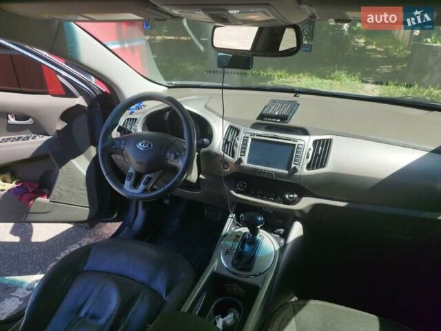 Синий Киа Sportage, объемом двигателя 2.4 л и пробегом 156 тыс. км за 12500 $, фото 4 на Automoto.ua