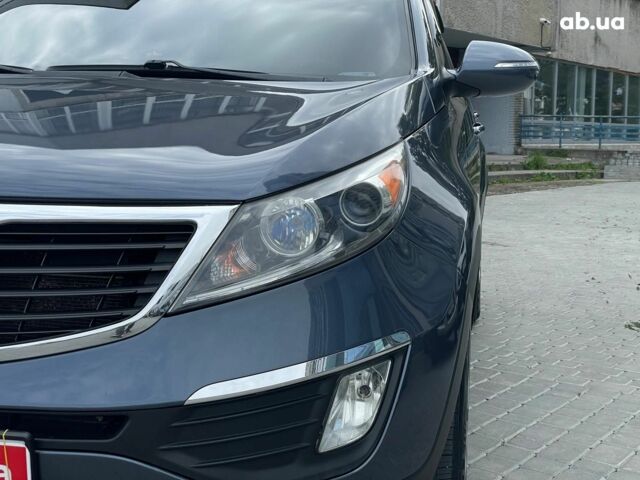 Синий Киа Sportage, объемом двигателя 2.4 л и пробегом 240 тыс. км за 15490 $, фото 10 на Automoto.ua