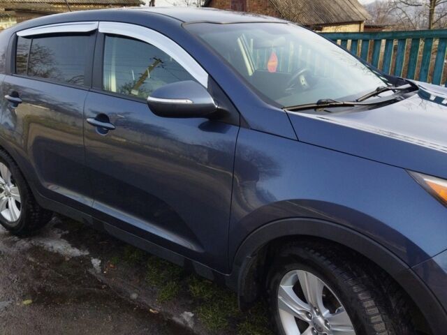 Синий Киа Sportage, объемом двигателя 2.4 л и пробегом 150 тыс. км за 12100 $, фото 7 на Automoto.ua