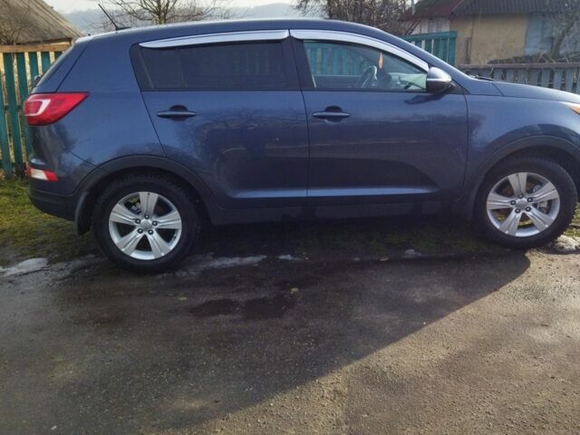 Синий Киа Sportage, объемом двигателя 2.4 л и пробегом 150 тыс. км за 12100 $, фото 4 на Automoto.ua