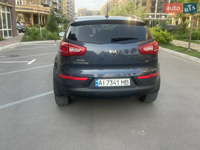 Синий Киа Sportage, объемом двигателя 2.4 л и пробегом 280 тыс. км за 12000 $, фото 4 на Automoto.ua