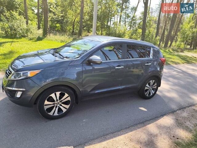 Синий Киа Sportage, объемом двигателя 2 л и пробегом 162 тыс. км за 12500 $, фото 11 на Automoto.ua