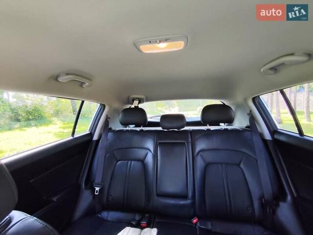 Синий Киа Sportage, объемом двигателя 2 л и пробегом 162 тыс. км за 12500 $, фото 414 на Automoto.ua