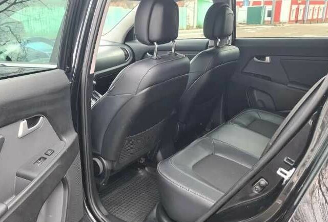 Синій Кіа Sportage, об'ємом двигуна 2 л та пробігом 163 тис. км за 12950 $, фото 7 на Automoto.ua