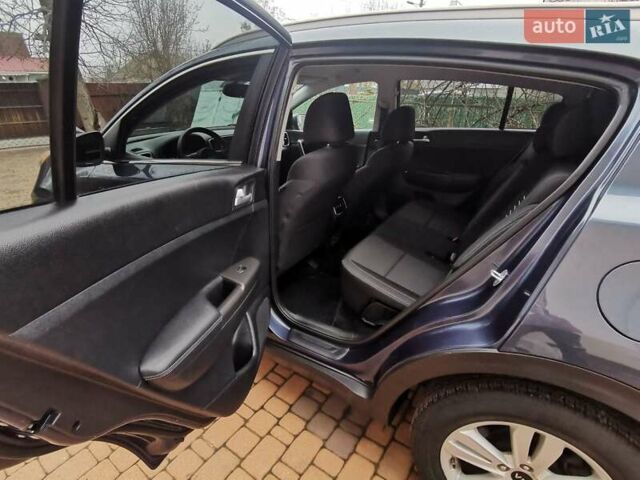 Синий Киа Sportage, объемом двигателя 2.36 л и пробегом 93 тыс. км за 15300 $, фото 10 на Automoto.ua