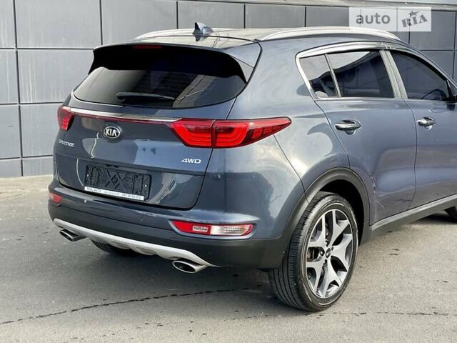 Синій Кіа Sportage, об'ємом двигуна 2 л та пробігом 146 тис. км за 19500 $, фото 61 на Automoto.ua