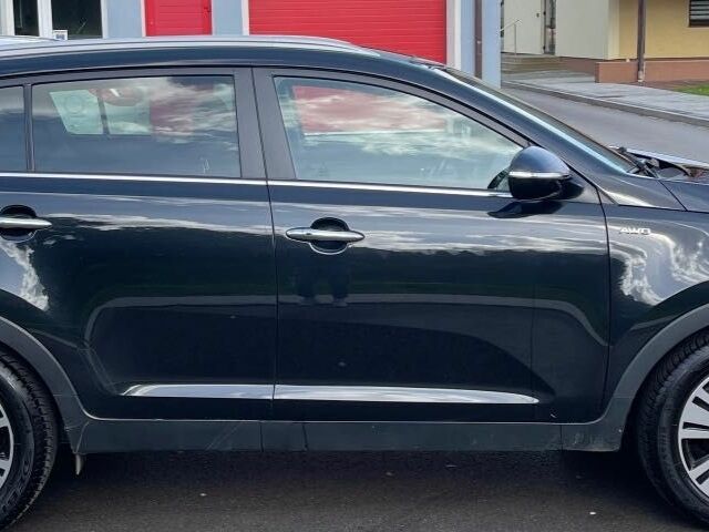 Синий Киа Sportage, объемом двигателя 2.4 л и пробегом 120 тыс. км за 8500 $, фото 5 на Automoto.ua