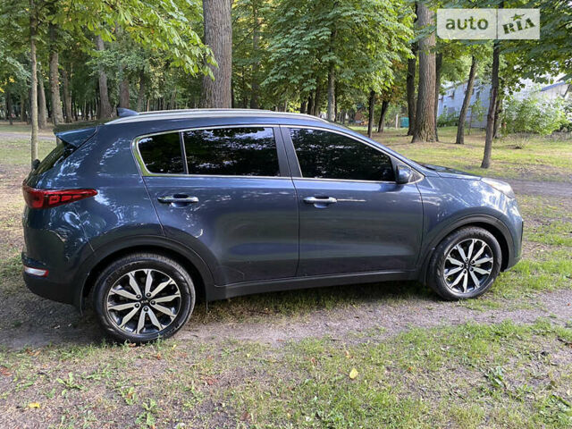 Синій Кіа Sportage, об'ємом двигуна 2.4 л та пробігом 111 тис. км за 16000 $, фото 4 на Automoto.ua