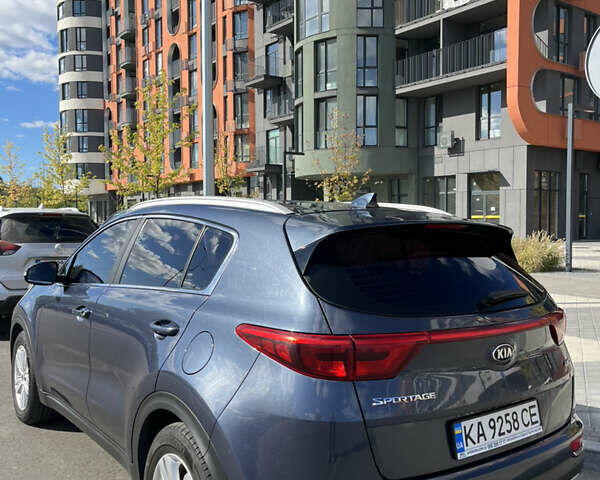 Синий Киа Sportage, объемом двигателя 2 л и пробегом 245 тыс. км за 18500 $, фото 3 на Automoto.ua