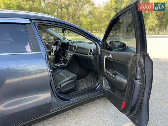 Синій Кіа Sportage, об'ємом двигуна 2 л та пробігом 150 тис. км за 17000 $, фото 14 на Automoto.ua