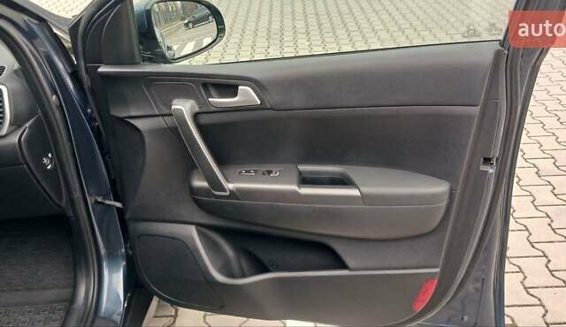 Синій Кіа Sportage, об'ємом двигуна 1.59 л та пробігом 58 тис. км за 18200 $, фото 17 на Automoto.ua