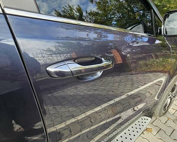 Синий Киа Sportage, объемом двигателя 2 л и пробегом 99 тыс. км за 26300 $, фото 19 на Automoto.ua