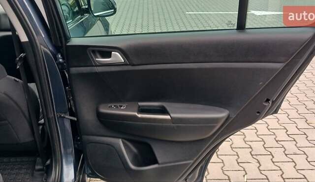 Синій Кіа Sportage, об'ємом двигуна 1.59 л та пробігом 58 тис. км за 18200 $, фото 14 на Automoto.ua