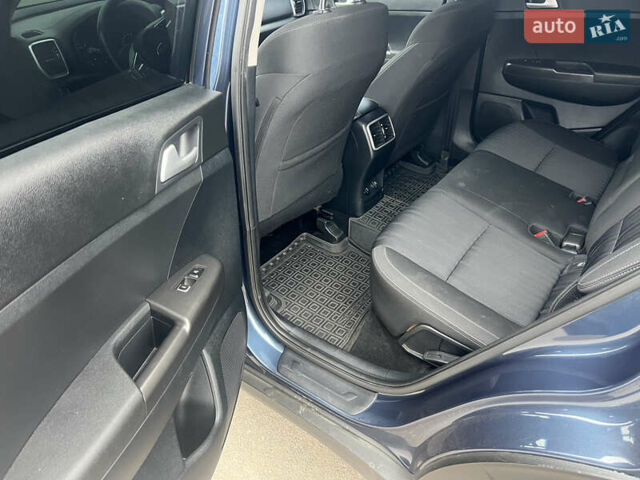 Синій Кіа Sportage, об'ємом двигуна 1.59 л та пробігом 178 тис. км за 14500 $, фото 14 на Automoto.ua