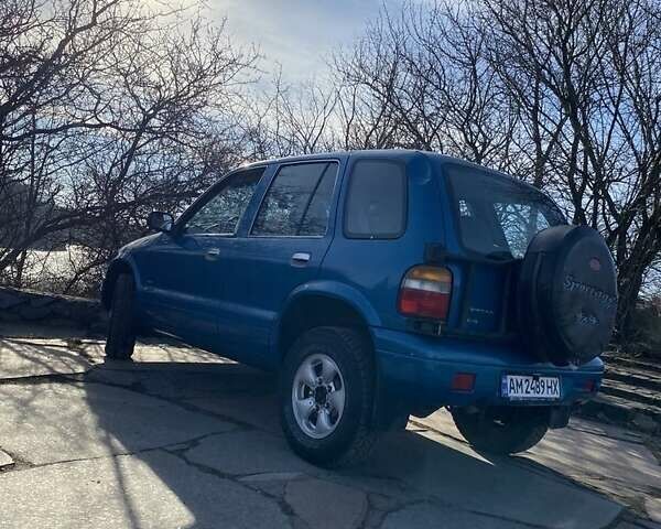 Зеленый Киа Sportage, объемом двигателя 2 л и пробегом 222 тыс. км за 2800 $, фото 19 на Automoto.ua