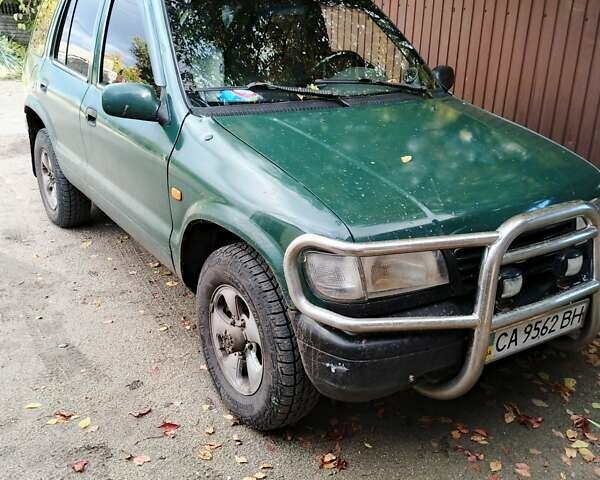 Зеленый Киа Sportage, объемом двигателя 2 л и пробегом 333 тыс. км за 3200 $, фото 1 на Automoto.ua