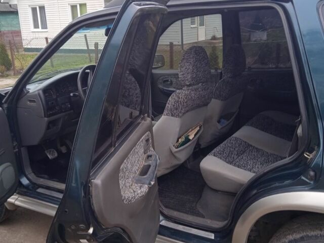 Зеленый Киа Sportage, объемом двигателя 2 л и пробегом 315 тыс. км за 3077 $, фото 3 на Automoto.ua