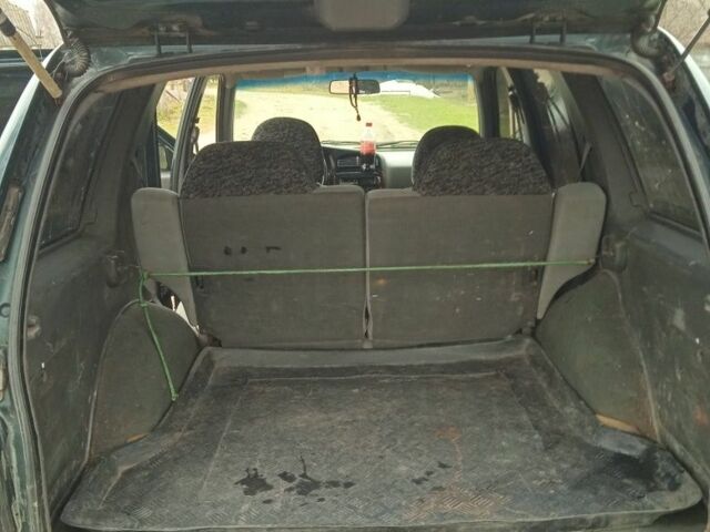 Зеленый Киа Sportage, объемом двигателя 2 л и пробегом 315 тыс. км за 3077 $, фото 5 на Automoto.ua