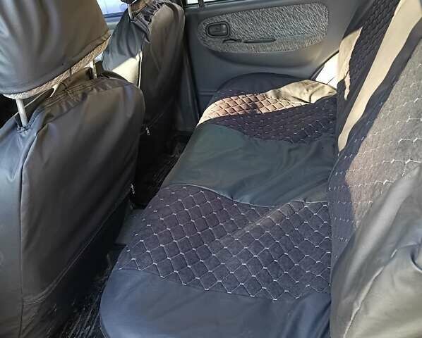 Зеленый Киа Sportage, объемом двигателя 2 л и пробегом 365 тыс. км за 4000 $, фото 10 на Automoto.ua