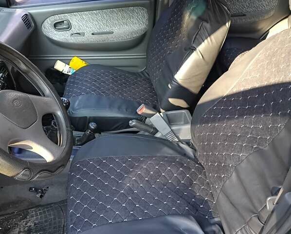 Зеленый Киа Sportage, объемом двигателя 2 л и пробегом 365 тыс. км за 4000 $, фото 9 на Automoto.ua