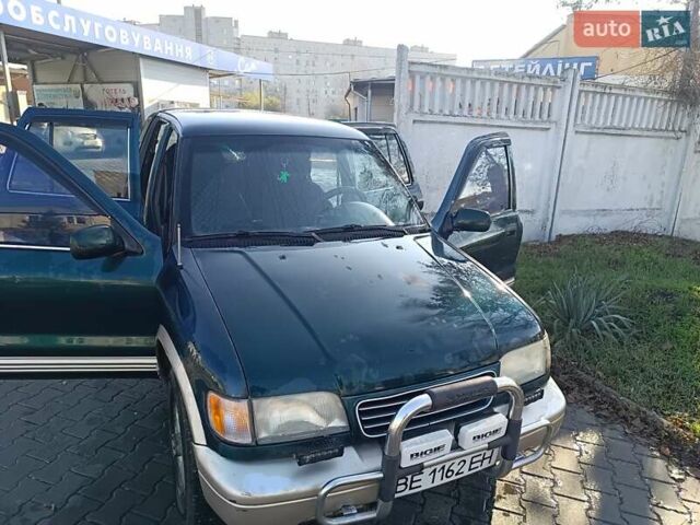 Зеленый Киа Sportage, объемом двигателя 2 л и пробегом 365 тыс. км за 4000 $, фото 4 на Automoto.ua