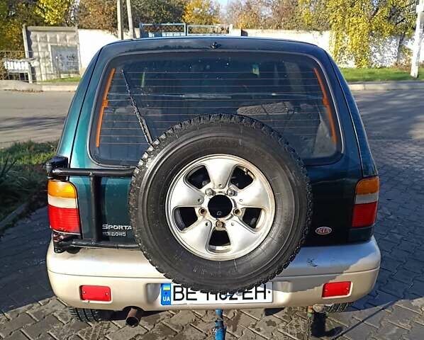Зеленый Киа Sportage, объемом двигателя 2 л и пробегом 365 тыс. км за 4000 $, фото 5 на Automoto.ua