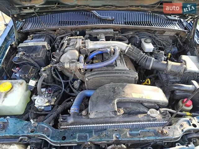 Зеленый Киа Sportage, объемом двигателя 2 л и пробегом 365 тыс. км за 4000 $, фото 8 на Automoto.ua