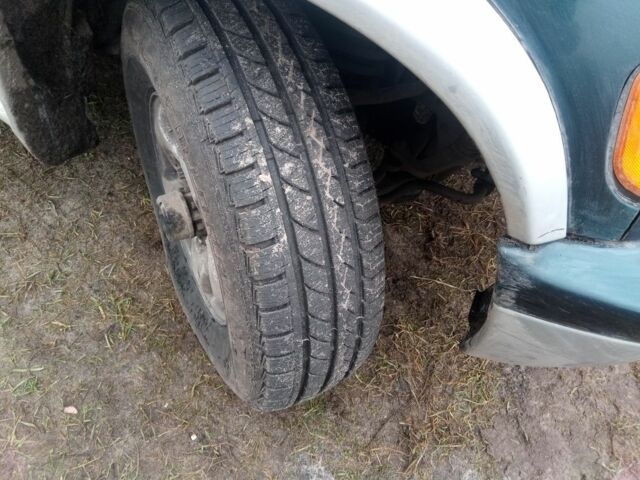 Зелений Кіа Sportage, об'ємом двигуна 2 л та пробігом 198 тис. км за 3900 $, фото 3 на Automoto.ua