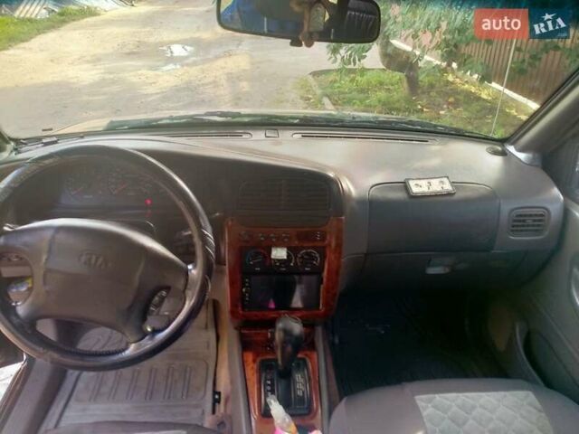 Зелений Кіа Sportage, об'ємом двигуна 2 л та пробігом 230 тис. км за 4500 $, фото 6 на Automoto.ua