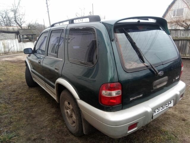 Зелений Кіа Sportage, об'ємом двигуна 2 л та пробігом 198 тис. км за 3900 $, фото 6 на Automoto.ua