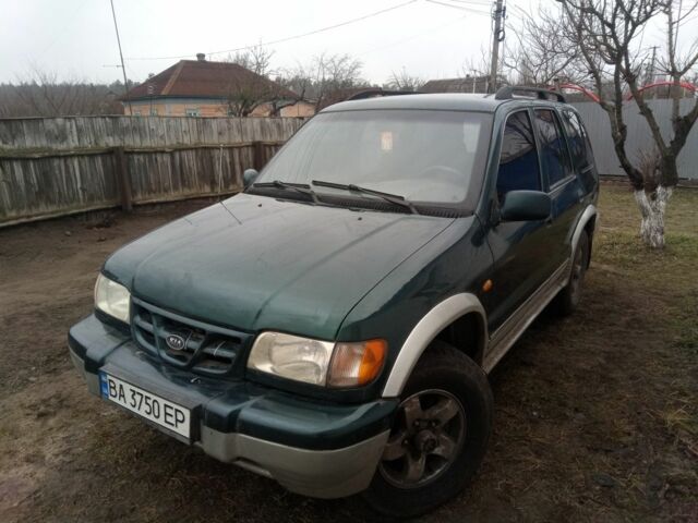 Зелений Кіа Sportage, об'ємом двигуна 2 л та пробігом 198 тис. км за 3900 $, фото 1 на Automoto.ua