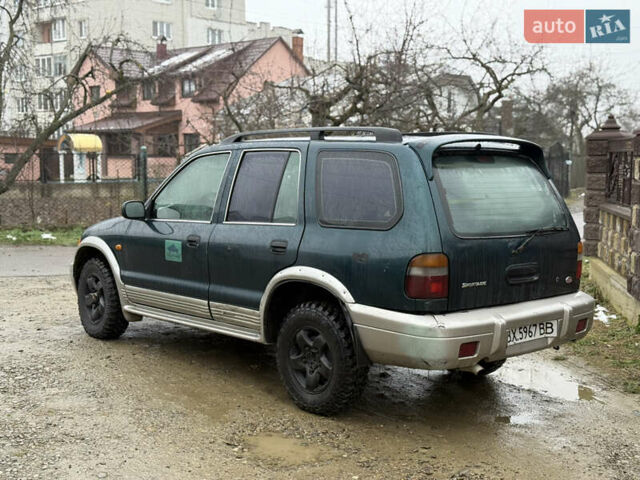 Зеленый Киа Sportage, объемом двигателя 2 л и пробегом 300 тыс. км за 3700 $, фото 4 на Automoto.ua