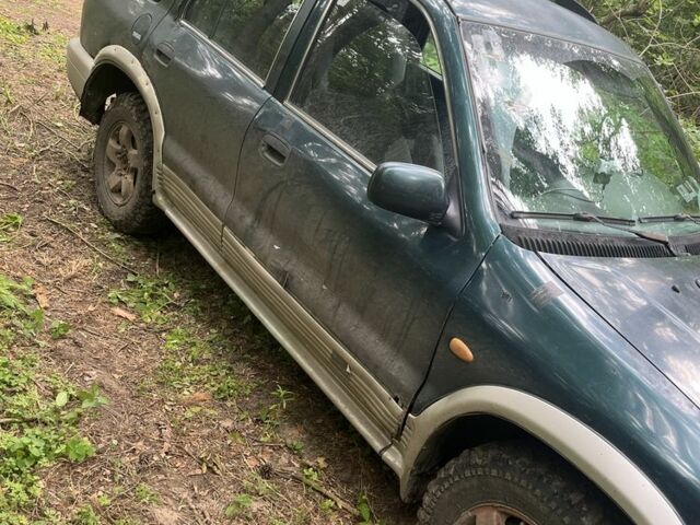 Зеленый Киа Sportage, объемом двигателя 2 л и пробегом 300 тыс. км за 3000 $, фото 3 на Automoto.ua