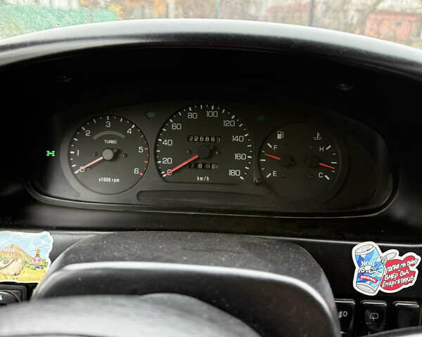 Зеленый Киа Sportage, объемом двигателя 2 л и пробегом 300 тыс. км за 3700 $, фото 7 на Automoto.ua