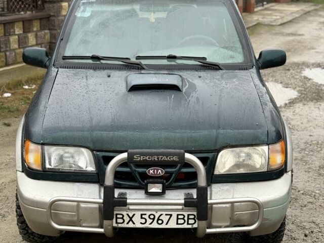 Зеленый Киа Sportage, объемом двигателя 2 л и пробегом 300 тыс. км за 3700 $, фото 1 на Automoto.ua