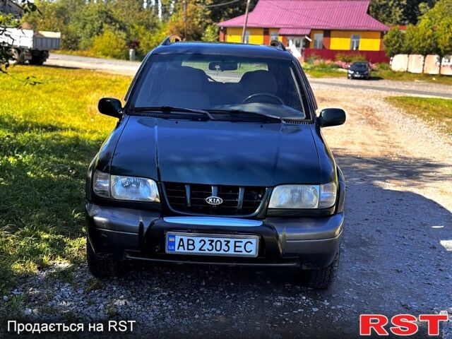 Зеленый Киа Sportage, объемом двигателя 2 л и пробегом 200 тыс. км за 3300 $, фото 3 на Automoto.ua