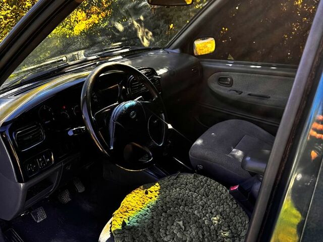 Зеленый Киа Sportage, объемом двигателя 2 л и пробегом 200 тыс. км за 3300 $, фото 6 на Automoto.ua