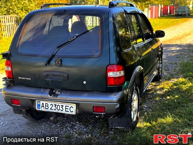 Зеленый Киа Sportage, объемом двигателя 2 л и пробегом 200 тыс. км за 3300 $, фото 2 на Automoto.ua
