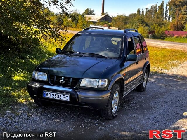Зеленый Киа Sportage, объемом двигателя 2 л и пробегом 200 тыс. км за 3300 $, фото 4 на Automoto.ua