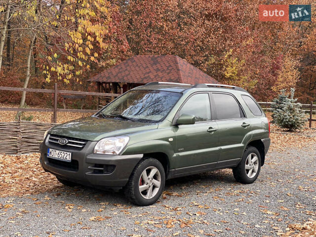 Зеленый Киа Sportage, объемом двигателя 2 л и пробегом 300 тыс. км за 3750 $, фото 3 на Automoto.ua