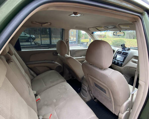 Зеленый Киа Sportage, объемом двигателя 2 л и пробегом 300 тыс. км за 3750 $, фото 19 на Automoto.ua