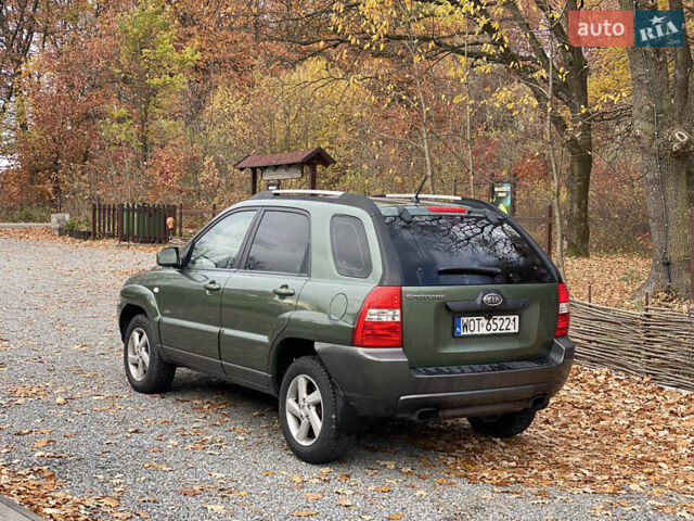 Зеленый Киа Sportage, объемом двигателя 2 л и пробегом 300 тыс. км за 3750 $, фото 11 на Automoto.ua