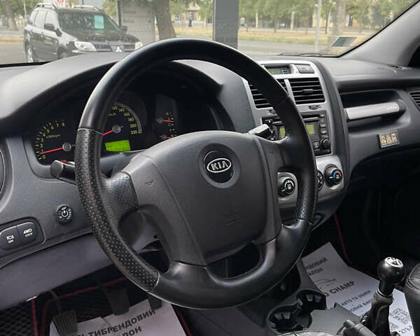 Зелений Кіа Sportage, об'ємом двигуна 1.98 л та пробігом 370 тис. км за 6500 $, фото 13 на Automoto.ua