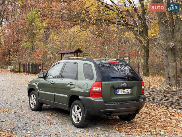 Зеленый Киа Sportage, объемом двигателя 2 л и пробегом 300 тыс. км за 3750 $, фото 12 на Automoto.ua