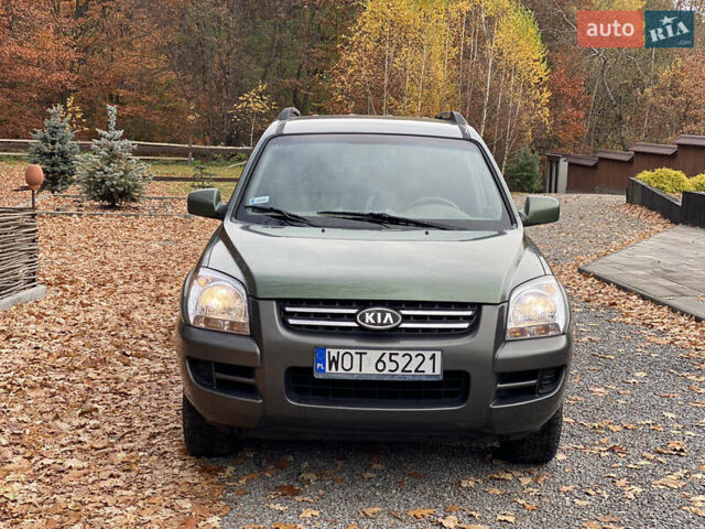Зеленый Киа Sportage, объемом двигателя 2 л и пробегом 300 тыс. км за 3750 $, фото 9 на Automoto.ua