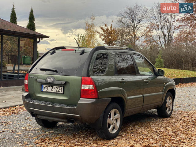 Зеленый Киа Sportage, объемом двигателя 2 л и пробегом 300 тыс. км за 3750 $, фото 16 на Automoto.ua