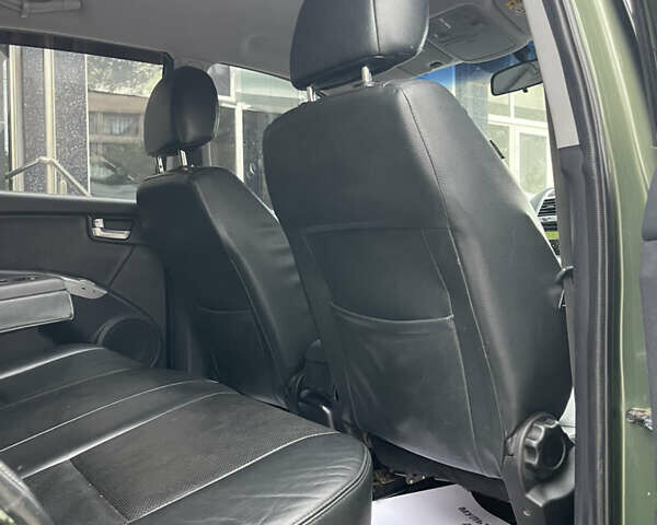 Зелений Кіа Sportage, об'ємом двигуна 1.98 л та пробігом 370 тис. км за 6500 $, фото 18 на Automoto.ua