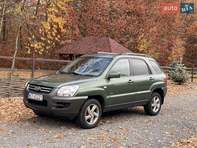Зеленый Киа Sportage, объемом двигателя 2 л и пробегом 300 тыс. км за 3750 $, фото 2 на Automoto.ua