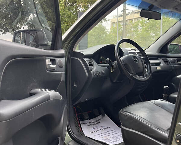 Зелений Кіа Sportage, об'ємом двигуна 1.98 л та пробігом 370 тис. км за 6500 $, фото 11 на Automoto.ua